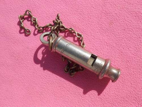 Police whistle.