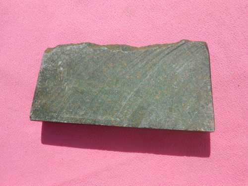 Small green-stone carving of a cheetahs - I am guessing it is Verdite.