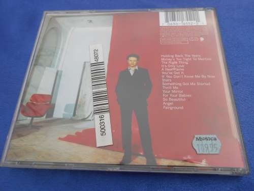 CD   Simply Red Greatest Hits.