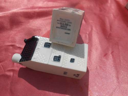 Blue Delft exclusively made for KLM by Bols Royal Distilleries Holland. Houses no. 18 and 28.