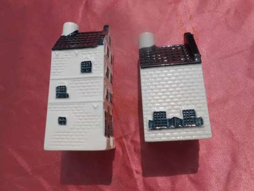 Blue Delft exclusively made for KLM by Bols Royal Distilleries Holland. Houses no. 18 and 28.