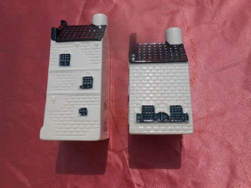 Blue Delft exclusively made for KLM by Bols Royal Distilleries Holland. Houses no. 18 and 28.