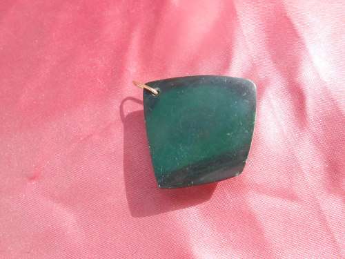 Semi-precious stone.  Pendant.