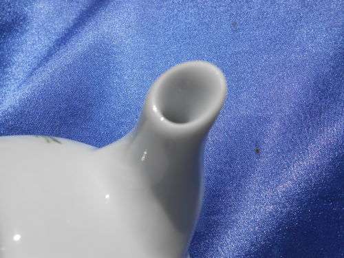 Small teapot.  Margaret Roberts.  Suitable for one cup or herbal tea. No chips, cracks or repairs.