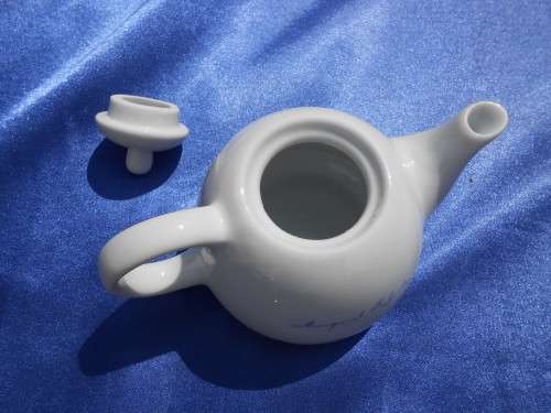 Small teapot.  Margaret Roberts.  Suitable for one cup or herbal tea. No chips, cracks or repairs.