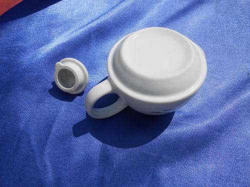 Small teapot.  Margaret Roberts.  Suitable for one cup or herbal tea. No chips, cracks or repairs.