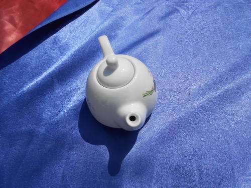 Small teapot.  Margaret Roberts.  Suitable for one cup or herbal tea. No chips, cracks or repairs.