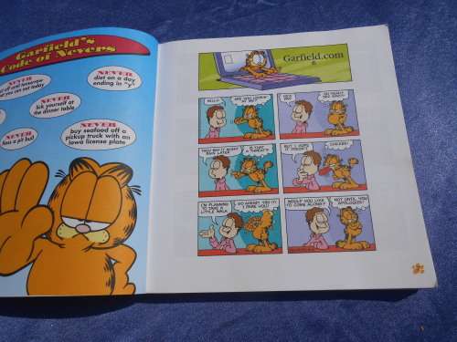 `Garfield Fat Cat 3 Pack`  Soft cover.