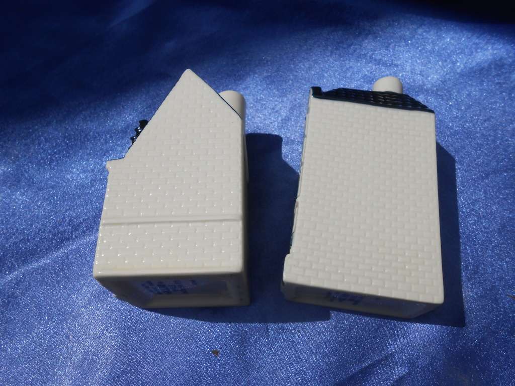 Blue Delft exclusively made for KLM by Bols Royal Distilleries Holland. Houses no. 57 and 89.