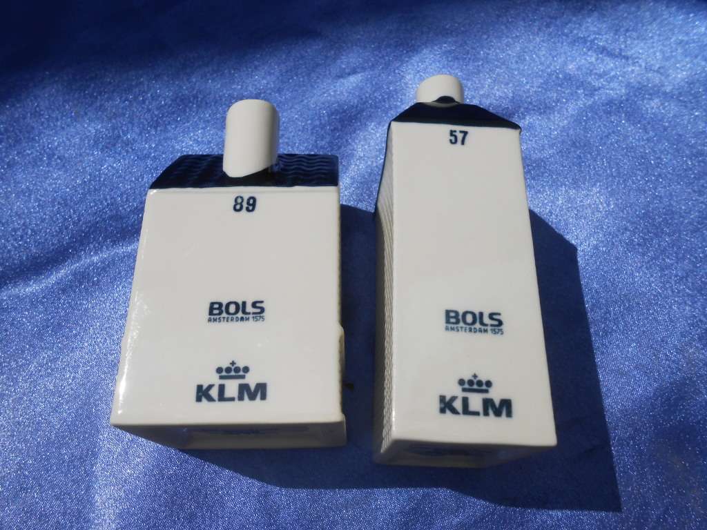 Blue Delft exclusively made for KLM by Bols Royal Distilleries Holland. Houses no. 57 and 89.