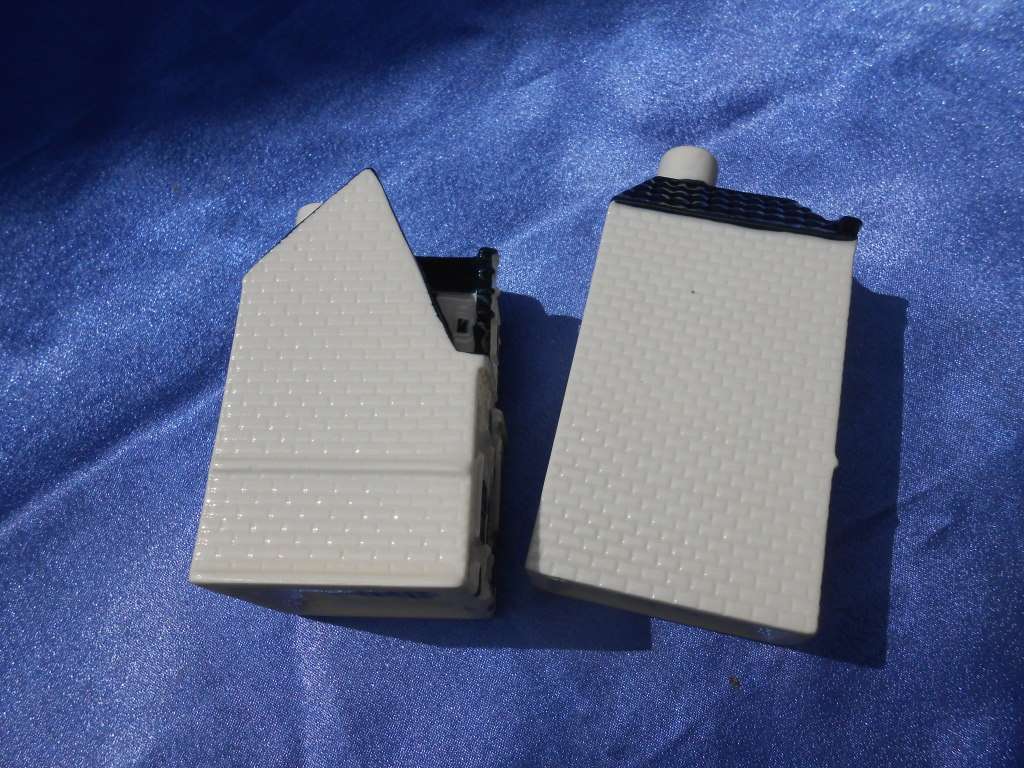 Blue Delft exclusively made for KLM by Bols Royal Distilleries Holland. Houses no. 57 and 89.