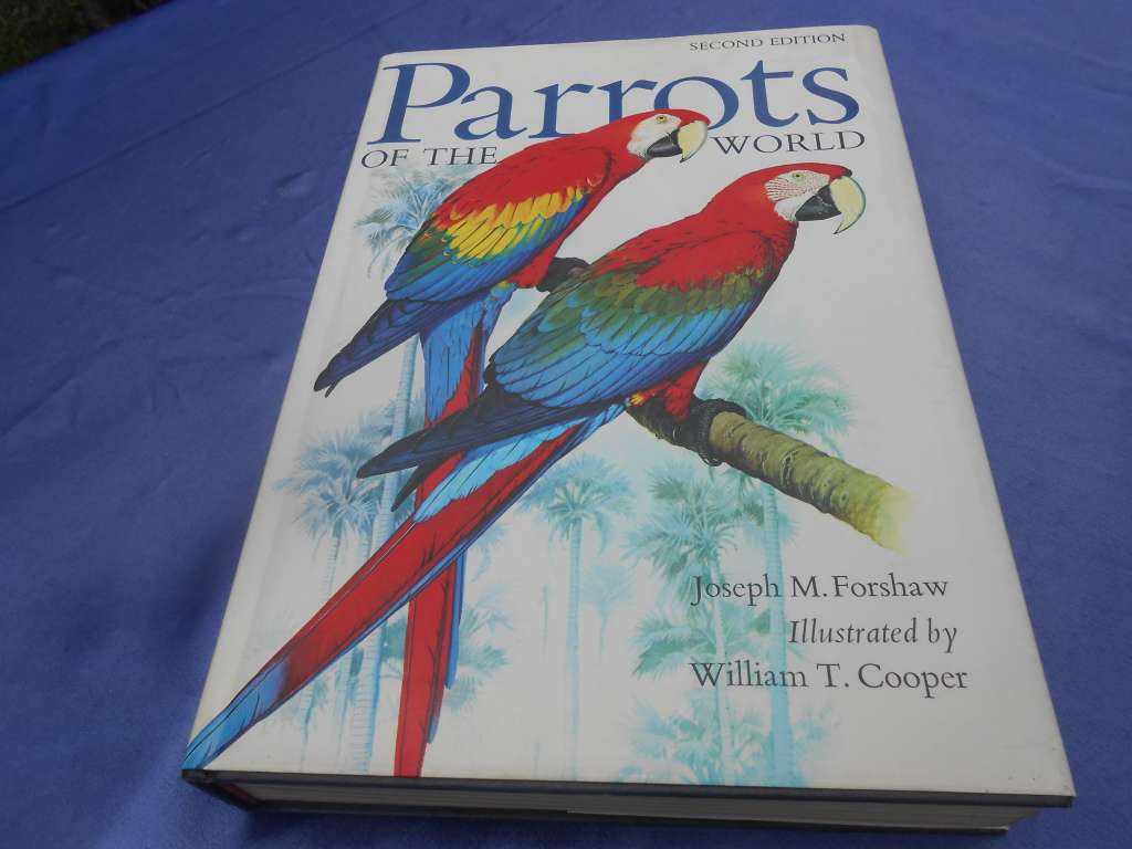 `Parrots of the World`  Second Edition.  Hard cover.  J.M. Forshaw.  A heavy book.