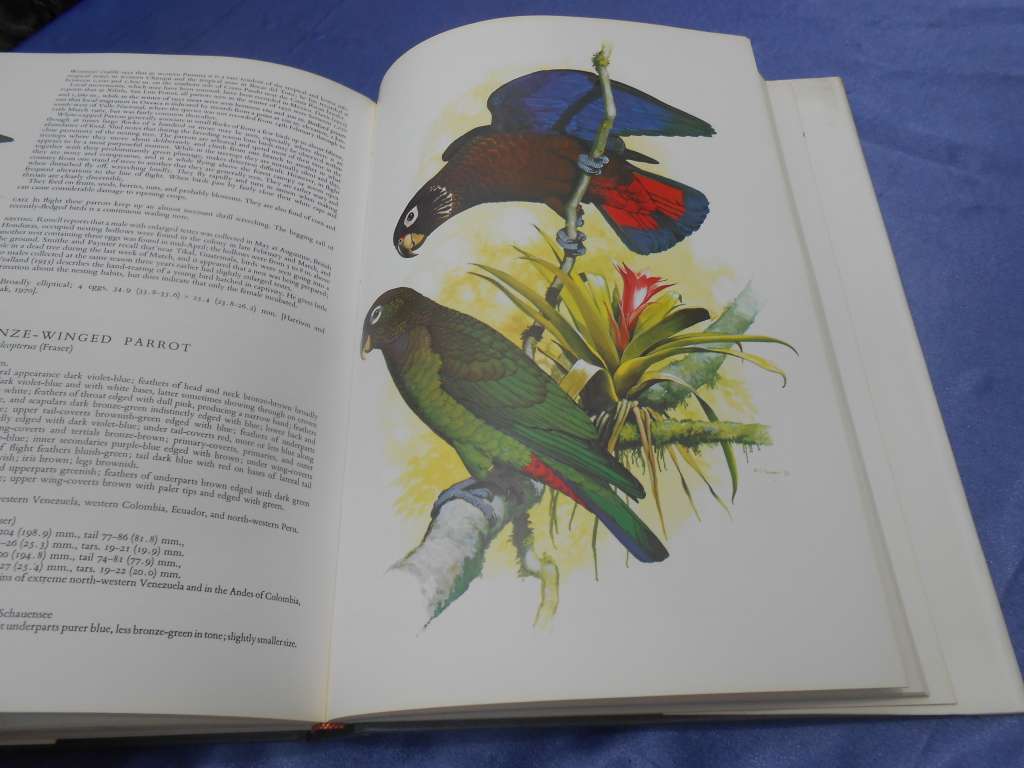 `Parrots of the World`  Second Edition.  Hard cover.  J.M. Forshaw.  A heavy book.