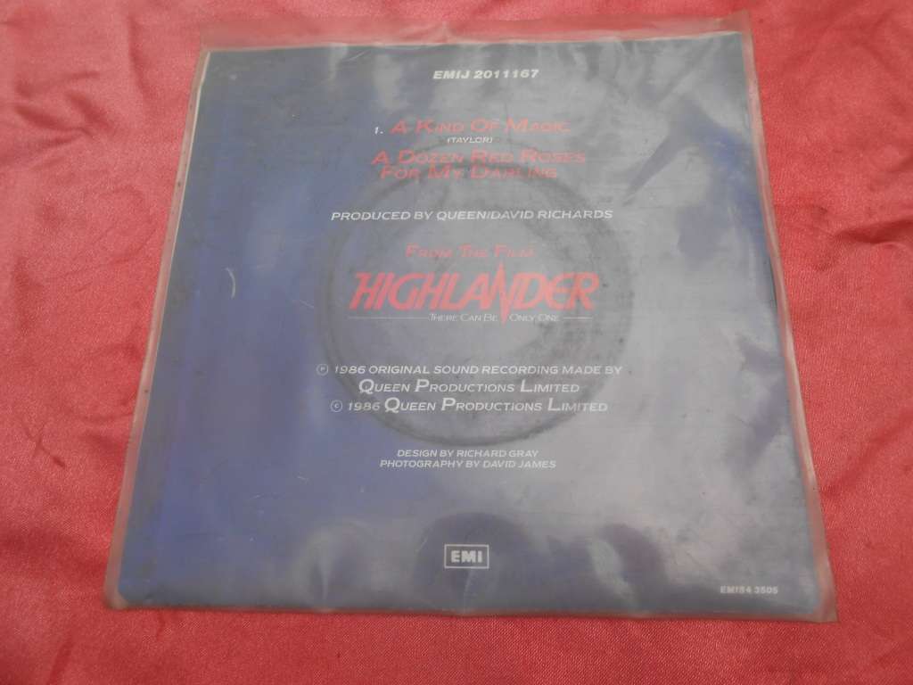 Vinyl 7` single. Queen  It`s a Kind of Magic.  A Dozen Red Roses for my Darling. VG+ VG+