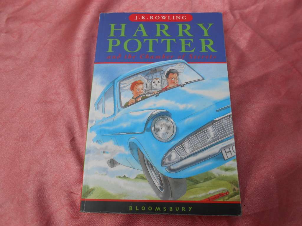 `Harry Potter and the Chamber of Secrets`  J.K. Rowling.  Soft cover.