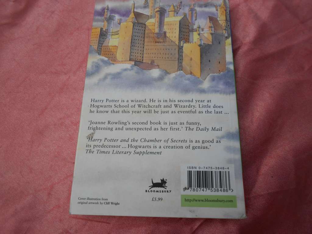 `Harry Potter and the Chamber of Secrets`  J.K. Rowling.  Soft cover.