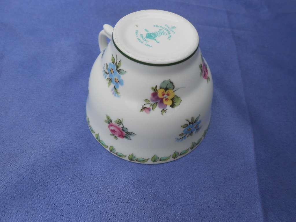 Single Crown Staffordshire cup.  Anniversary Greetings - August.  No chips, cracks or repairs.