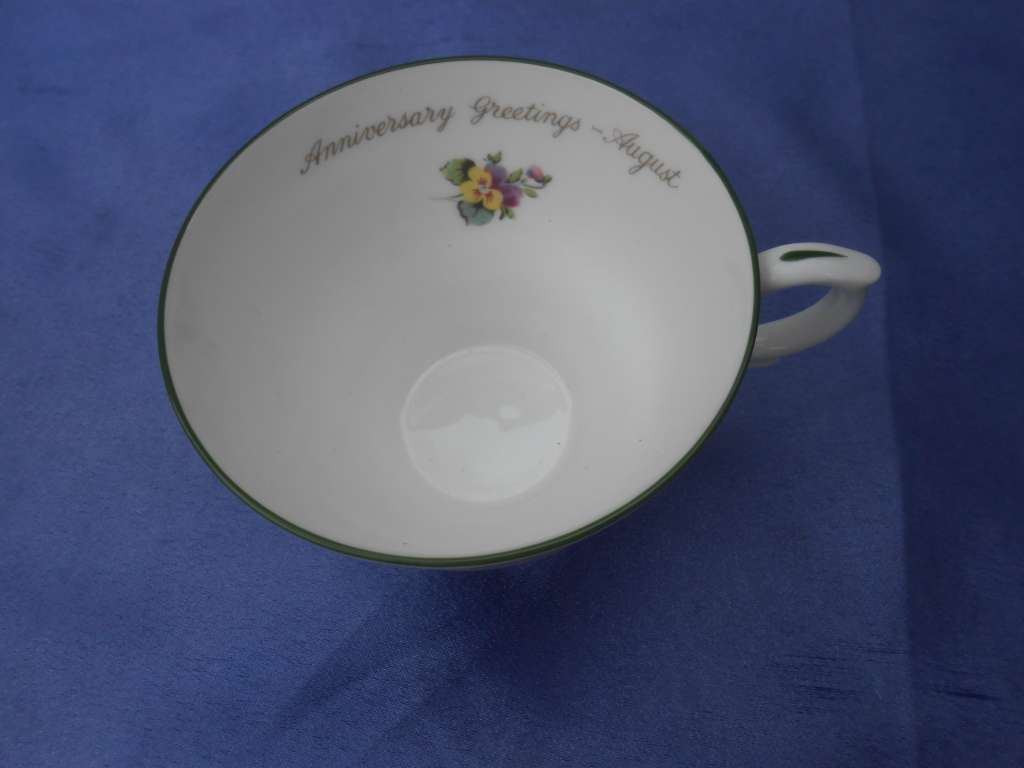 Single Crown Staffordshire cup.  Anniversary Greetings - August.  No chips, cracks or repairs.