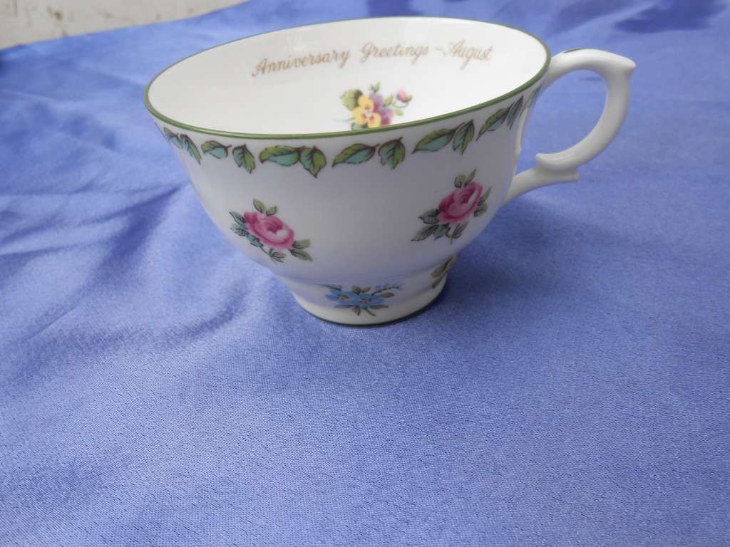 Single Crown Staffordshire cup.  Anniversary Greetings - August.  No chips, cracks or repairs.