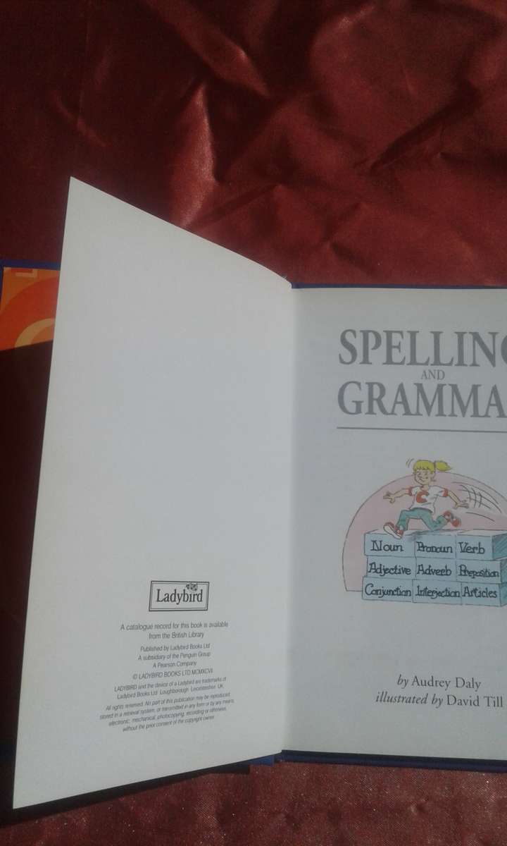`Spelling and Grammar`. Hard cover.  Ladybird.