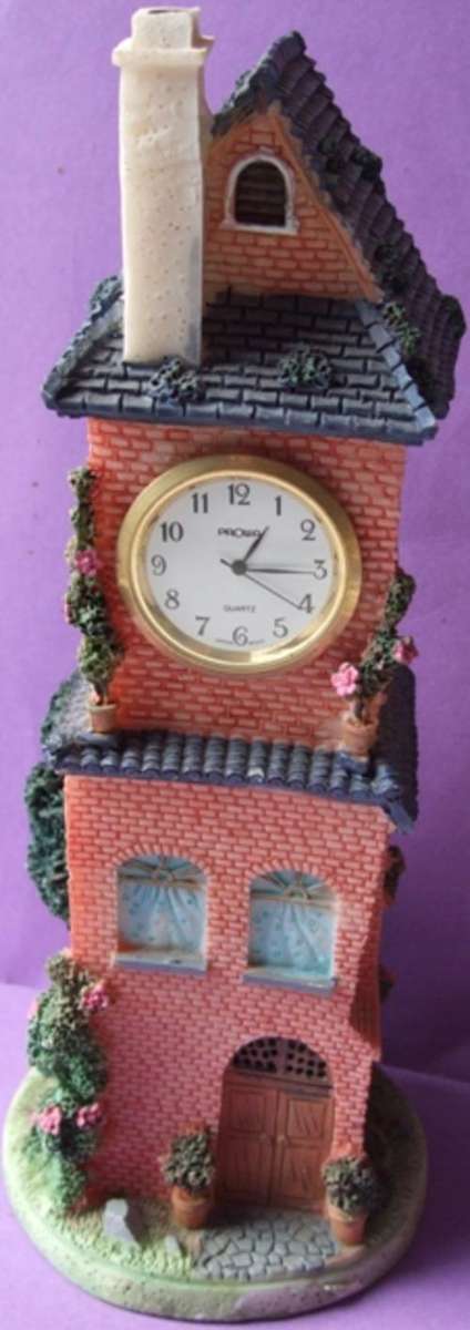 Long village house or tower with Clock ornament