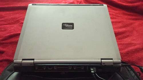 Laptop with Accessories: Lifebook E8020 Fujitsu/Siemens (for use as-is, or spares and repairs)