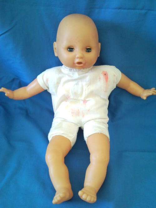 Old, Well Played With Baby Doll