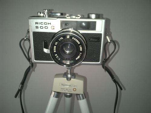 Vintage Ricoh 500G camera with adjustable lense. Auto timer. Still in working order.