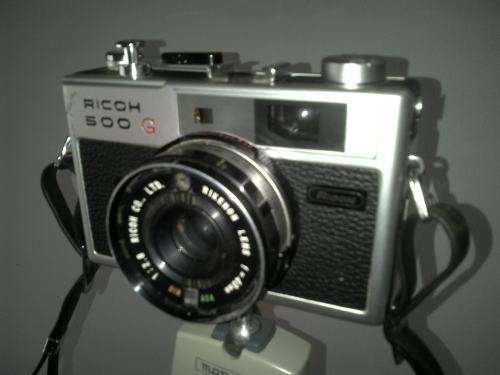 Vintage Ricoh 500G camera with adjustable lense. Auto timer. Still in working order.
