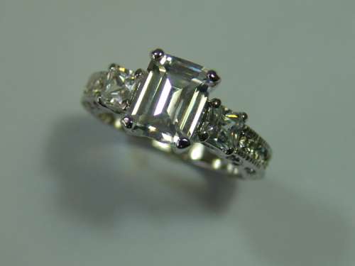 White Sapphires Ring set in 18ct white filled Gold