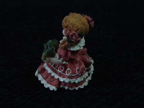 Vintage resin figurine of a Girl with an Umbrella