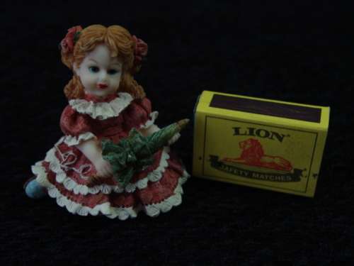 Vintage resin figurine of a Girl with an Umbrella