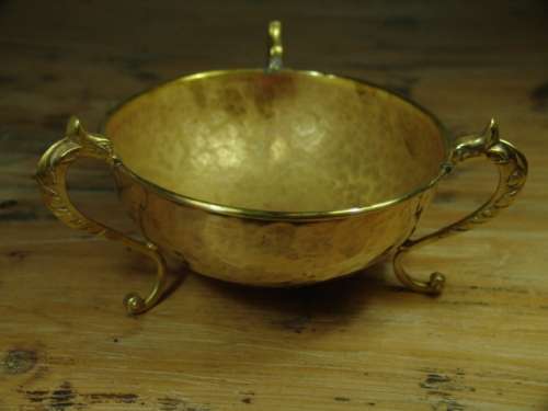 Vintage solid hammered brass footed Bowl with Dragon shaped handles