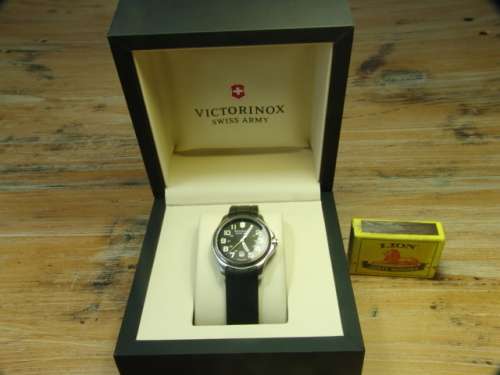 Victorinox, Swiss Army stainless steel on rubber strap mens wristwatch in original box. 100% working