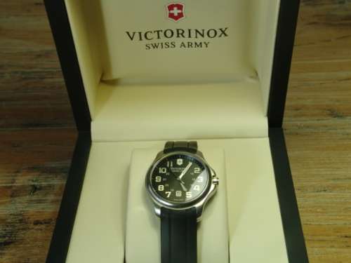 Victorinox, Swiss Army stainless steel on rubber strap mens wristwatch in original box. 100% working