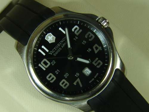 Victorinox, Swiss Army stainless steel on rubber strap mens wristwatch in original box. 100% working