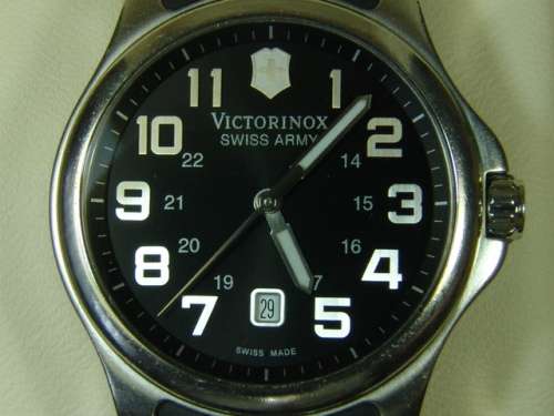Victorinox, Swiss Army stainless steel on rubber strap mens wristwatch in original box. 100% working