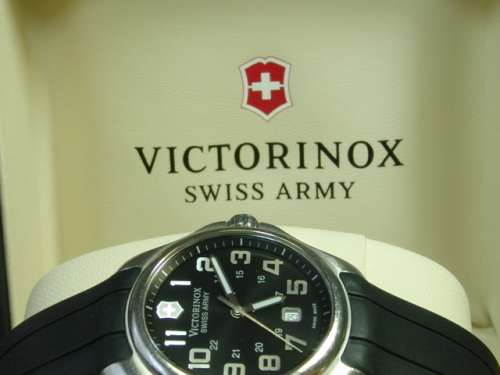 Victorinox, Swiss Army stainless steel on rubber strap mens wristwatch in original box. 100% working