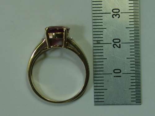 9ct Yellow gold,  African ruby and diamond Ring. Total weight 4 grams.