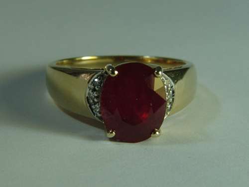 9ct Yellow gold,  African ruby and diamond Ring. Total weight 4 grams.
