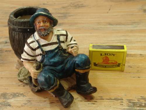 Fisherman with barrel figurine, vintage