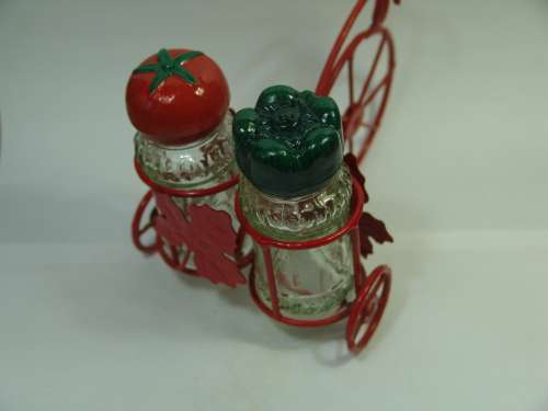 Spice shakers on a Bicycle stand, vintage