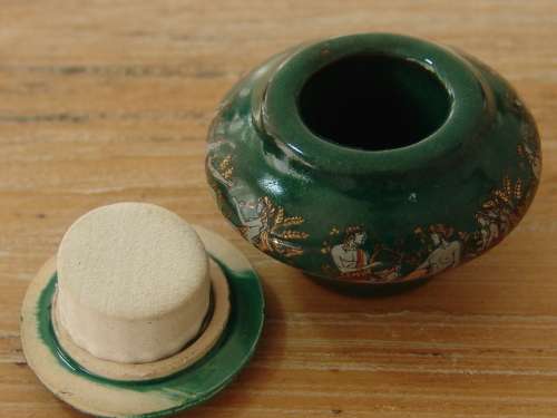 Small ceramic Poison container with Roman detail and pouch. Empty, 3cm