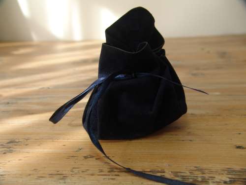 Small ceramic Poison container with Roman detail and pouch. Empty, 3cm