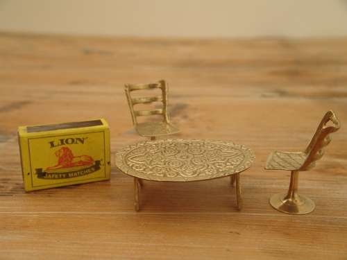 Miniature brass furniture, Table and two Chairs
