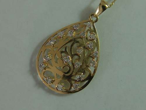 10ct Yellow gold teardrop pendant with 18 natural diamonds on a 9ct yellow gold chain