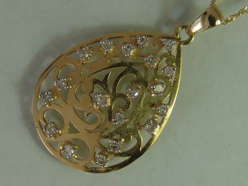 10ct Yellow gold teardrop pendant with 18 natural diamonds on a 9ct yellow gold chain