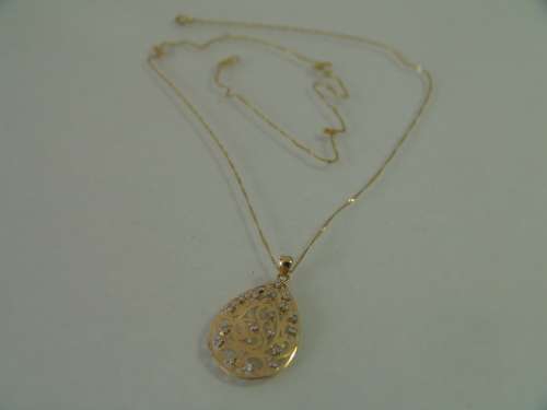 10ct Yellow gold teardrop pendant with 18 natural diamonds on a 9ct yellow gold chain