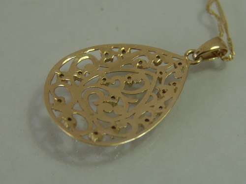 10ct Yellow gold teardrop pendant with 18 natural diamonds on a 9ct yellow gold chain