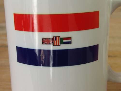 Old South African flag on a coffee mug